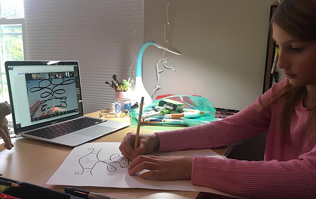 Young Student Practicing Drawing At Home During BW CAS Summer Virtual Arts Camp